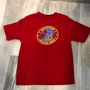 Shirt size 7 with surfing theme